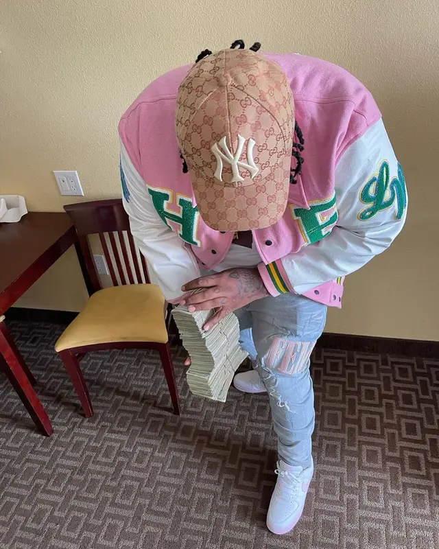Big Yavo outfit in Homme + Femme, Bape, and Gucci, 2021