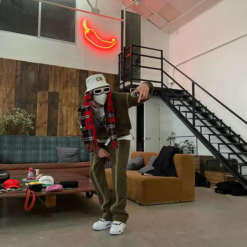 Kidd Keo outfit in Gucci, Tommy Hilfiger, and Burberry, 2021