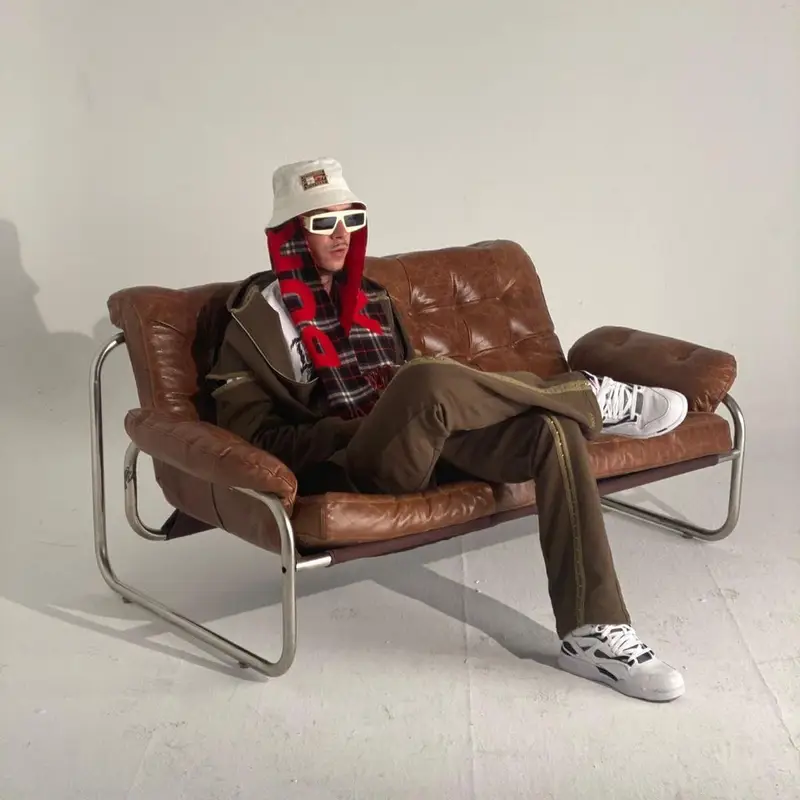 Kidd Keo outfit in Gucci, Tommy Hilfiger, and Burberry, 2021