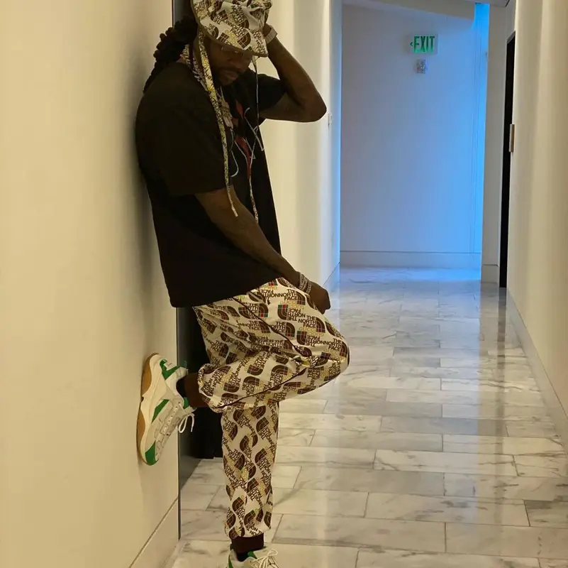 2 Chainz outfit in Vlone, Gucci, and The North Face, 2021