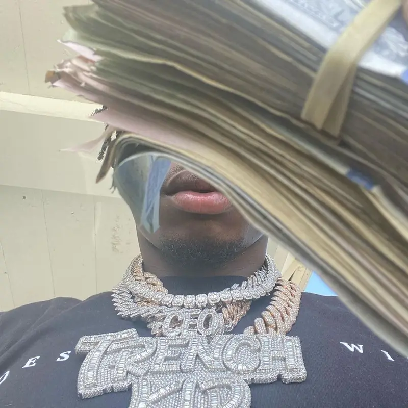 Lil Tjay outfit in Amiri, Dior, and Valentino, 2021