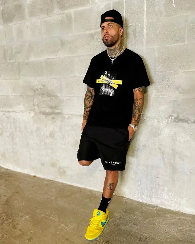 Nicky Jam outfit in Givenchy, Grateful Dead, and Nike, 2021