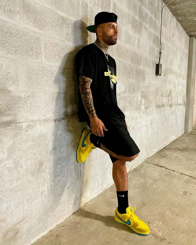 Nicky Jam outfit in Givenchy, Grateful Dead, and Nike, 2021