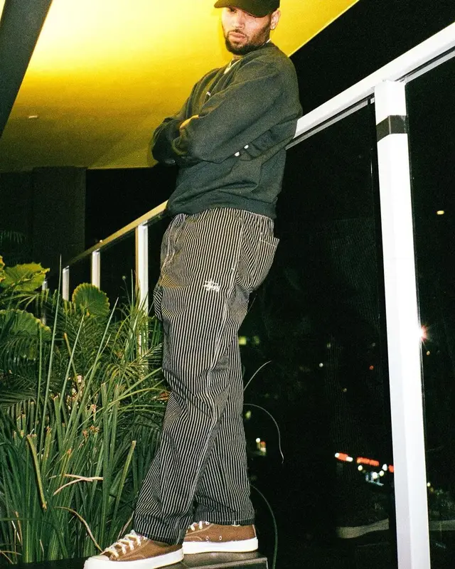 Chris Brown outfit in Hubble Studio, Stussy, and Tuff Crowd, 2021