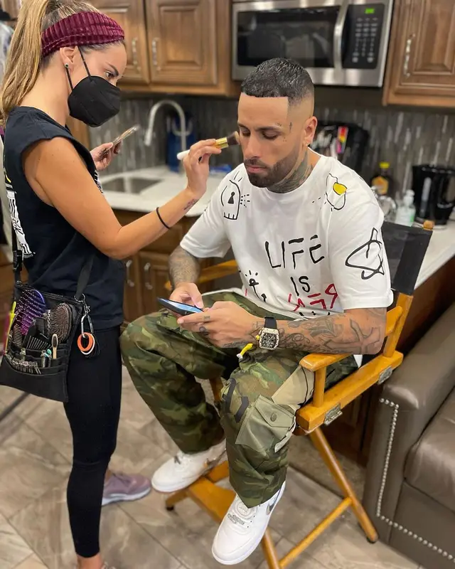 Nicky Jam outfit in Trevor Andrew, Palm Angels, and Nike, 2021