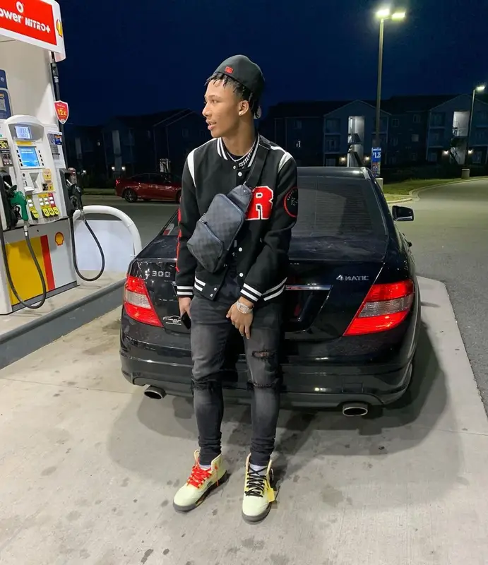 Mikey outfit in Vlone, Louis Vuitton, and New Era, 2021
