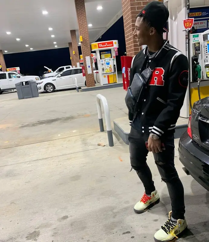 Mikey outfit in Vlone, Louis Vuitton, and New Era, 2021