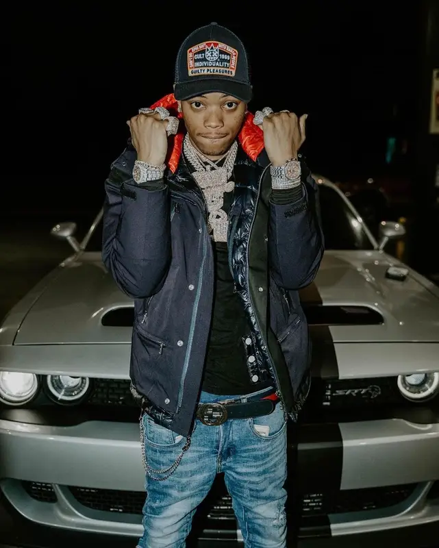 Lil Migo outfit in Chanel, Gucci, and Cult of Individuality, 2021
