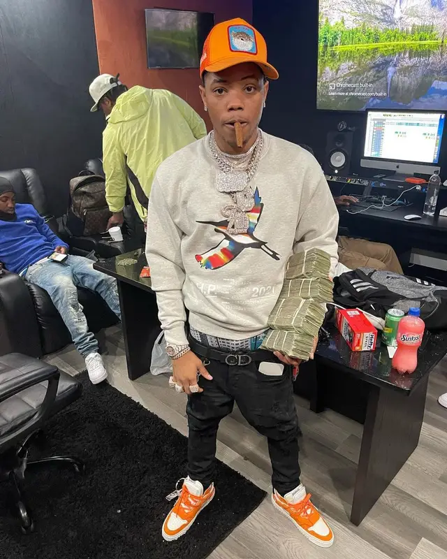 Lil Migo outfit in Heron Preston, Brioni, and Goorin Bros, 2021