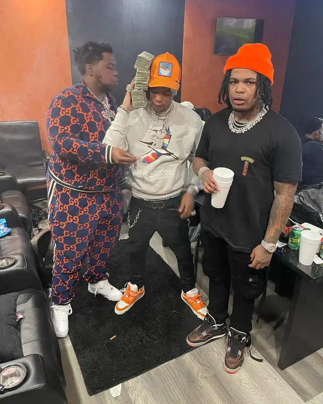 Lil Migo outfit in Heron Preston, Brioni, and Goorin Bros, 2021