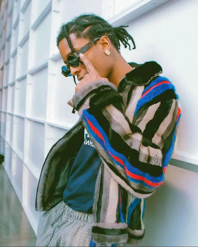ASAP Rocky outfit in Fila, Gosha Rubchinskiy, and Retrosuperfuture, 2021