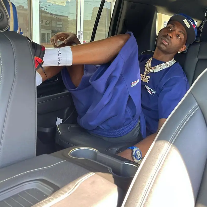 Young Dolph outfit in Balenciaga, Audemars Piguet, and New Era, 2021