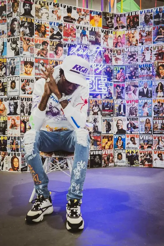 Yung Mal outfit in Dior, Cartier, and RoyGBiv, 2021