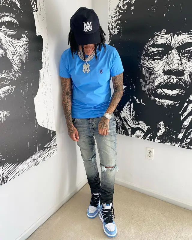 Young M.A outfit in Burberry, Purple Brand, and Amiri, 2021