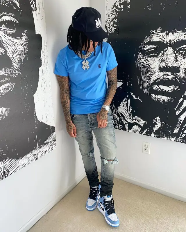 Young M.A outfit in Burberry, Purple Brand, and Amiri, 2021
