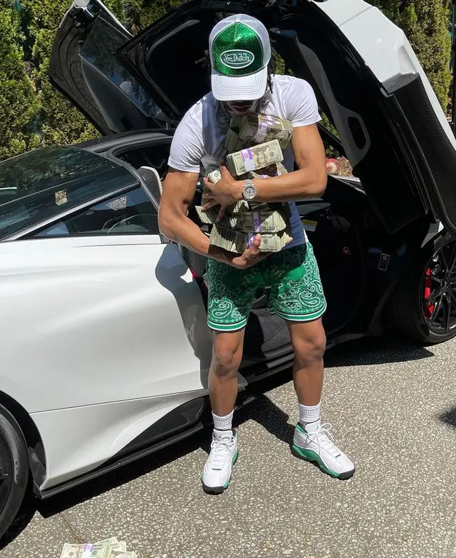 Lil Baby outfit in Amiri, Jordan, and Von Dutch, 2021