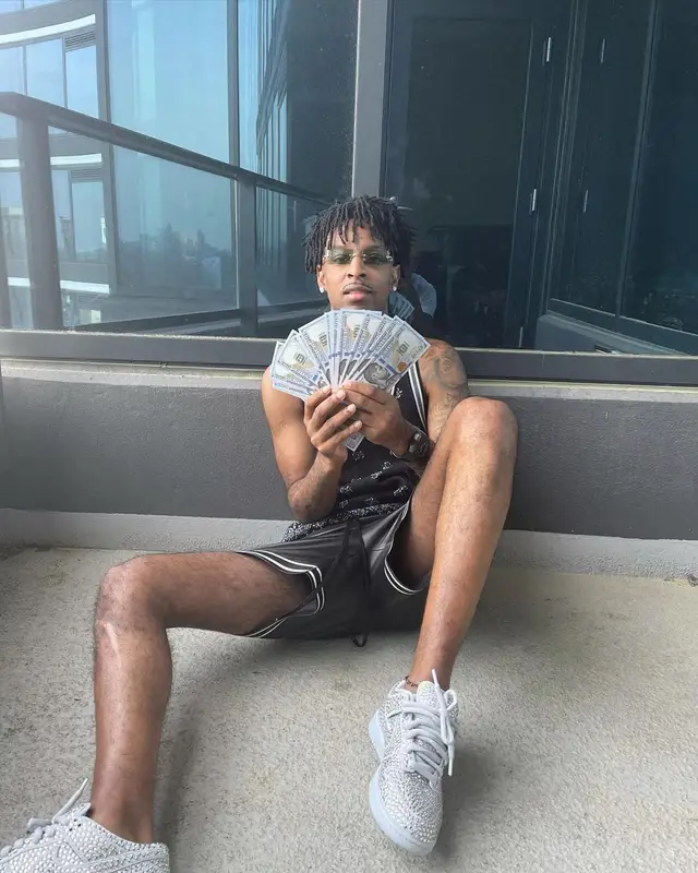 21 Savage outfit in Amiri, Nike, and Chrome Hearts, 2021