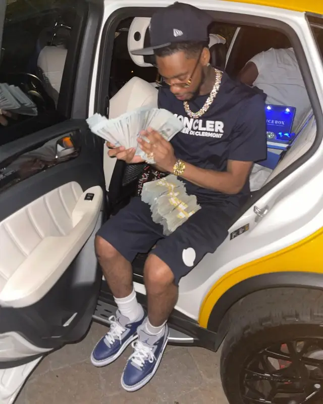 Key Glock outfit in Moncler and Jordan, 2021