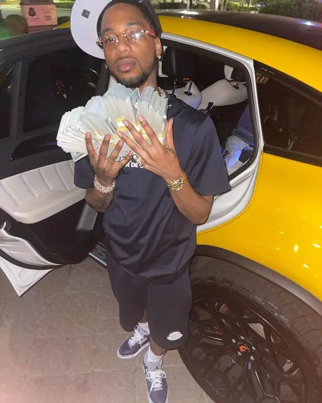 Key Glock outfit in Moncler and Jordan, 2021
