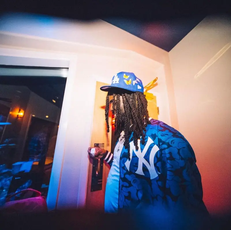 Chief Keef outfit in Bape, Amiri, and Mitchell & Ness, 2021