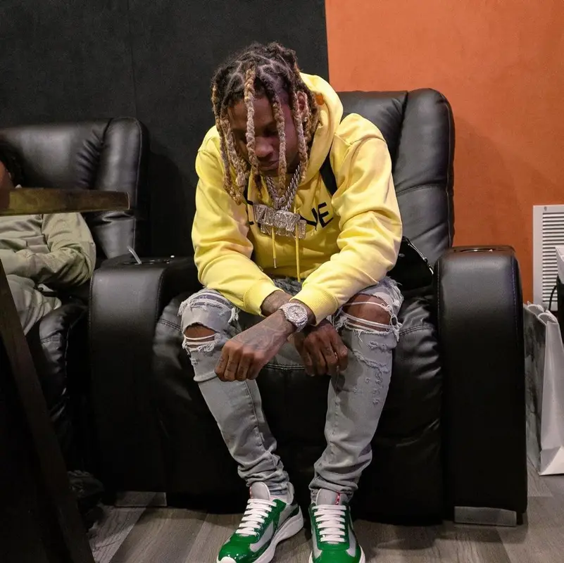 Lil Durk outfit in Celine, Prada, and Amiri, 2021