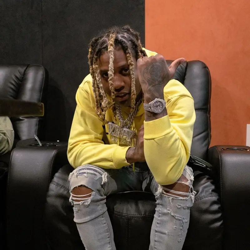 Lil Durk outfit in Celine, Prada, and Amiri, 2021