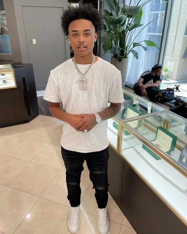Luh Kel outfit in Dior, Amiri, and Louis Vuitton, 2021