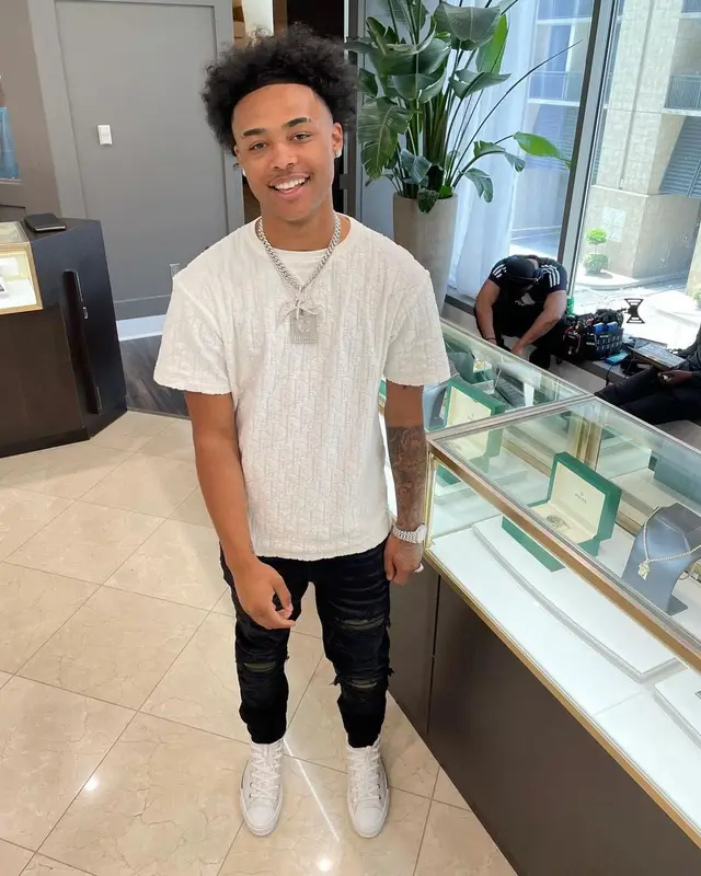 Luh Kel outfit in Dior, Amiri, and Louis Vuitton, 2021