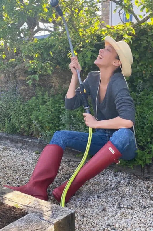 Bella Hadid outfit in Celine, Hunter Boots, and Clyde, 2020