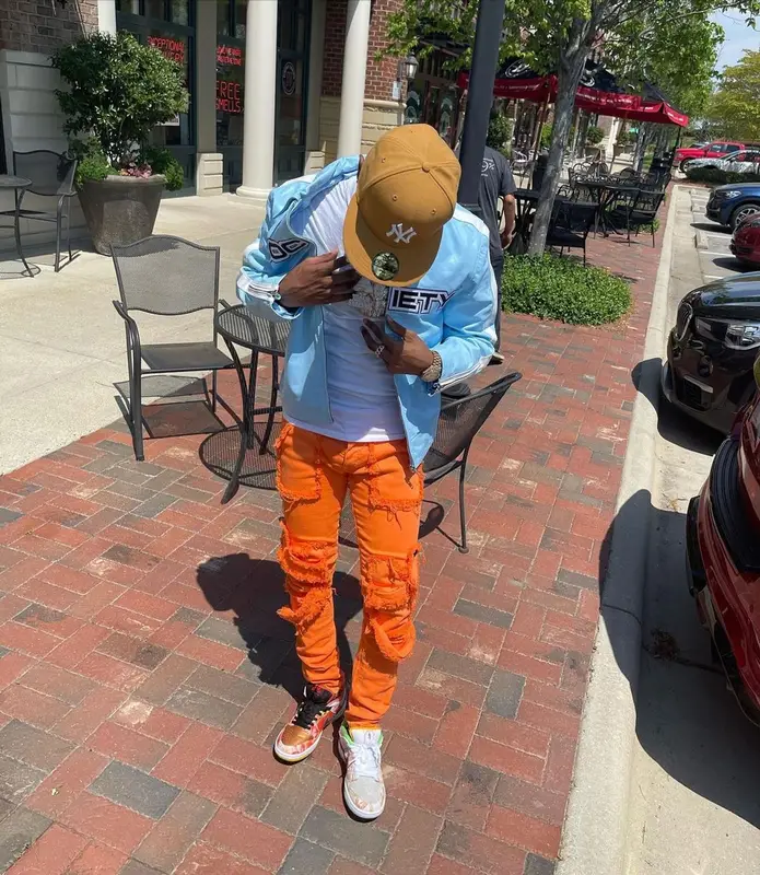 Toosii outfit in Society, Valabasas, and New Era, 2021