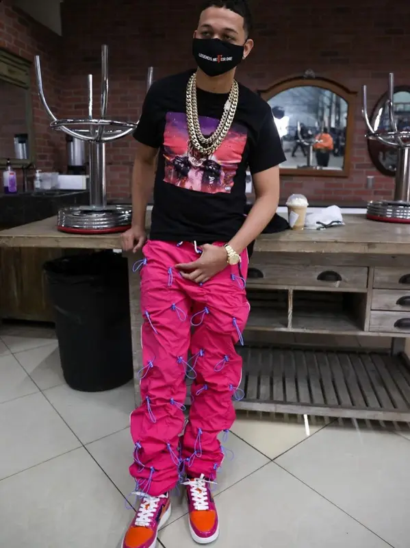 Lil Bibby outfit in Juice Wrld Merch, Bape, and Vlone, 2021