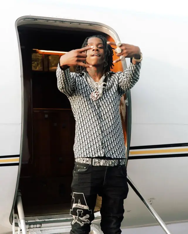Polo G outfit in Dior and Amiri, 2021