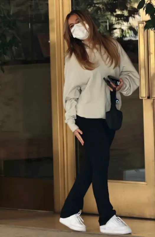 Addison Rae outfit in Nike, Prada, and Saint Laurent, 2021