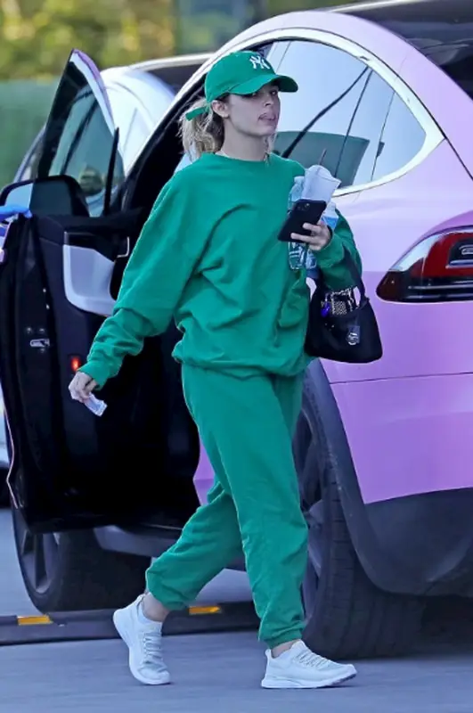 Addison Rae outfit in Prada, New Era, and Saint Laurent, 2021