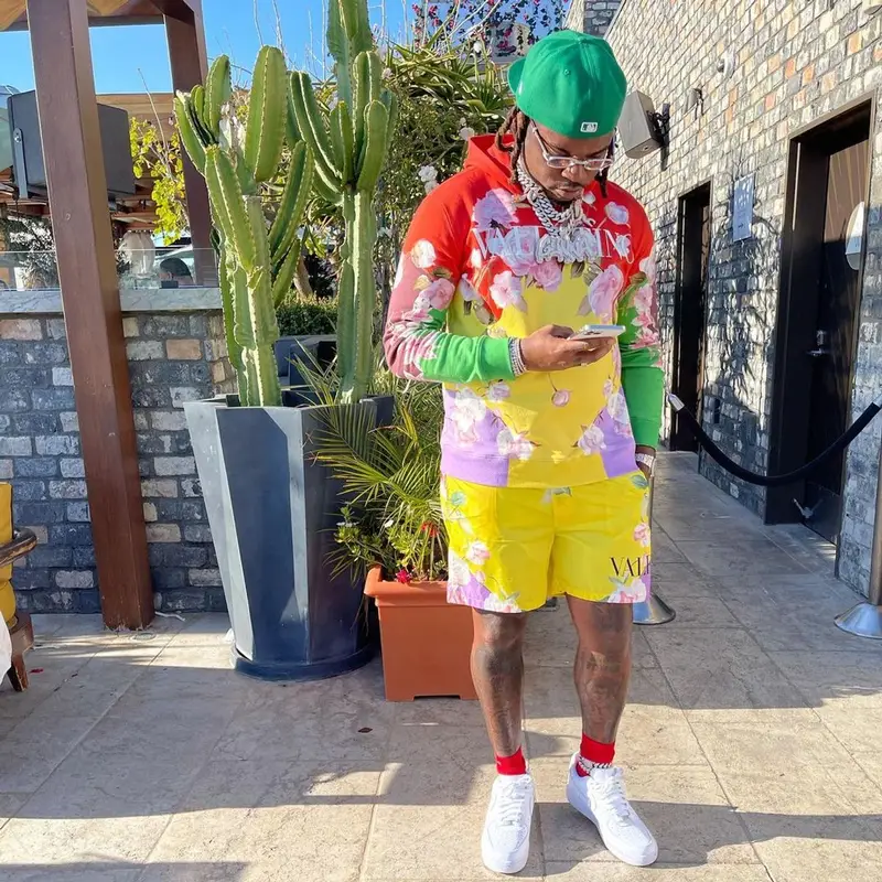 Gunna outfit in Valentino, Nike, and Cartier, 2021