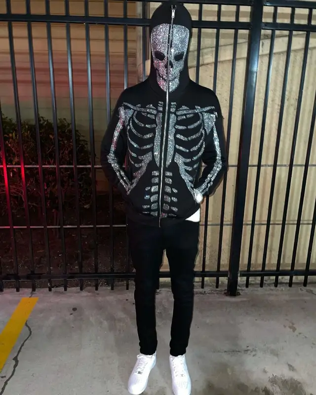 Yung Mal outfit in 21 Envy, Klan Life, and Nike, 2021
