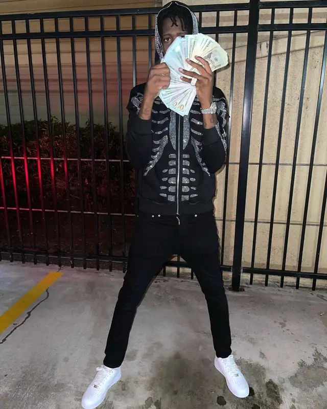 Yung Mal outfit in 21 Envy, Klan Life, and Nike, 2021