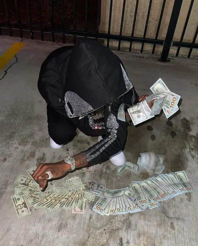 Yung Mal outfit in 21 Envy, Klan Life, and Nike, 2021