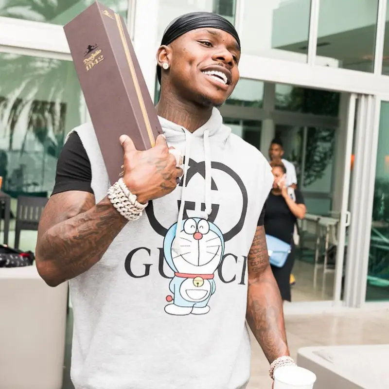 DaBaby outfit in Gucci, Amiri, and Louis Vuitton, 2021