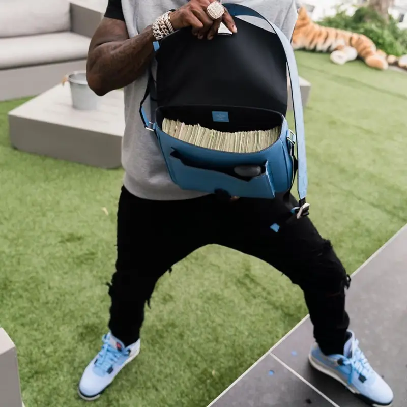 DaBaby outfit in Gucci, Amiri, and Louis Vuitton, 2021