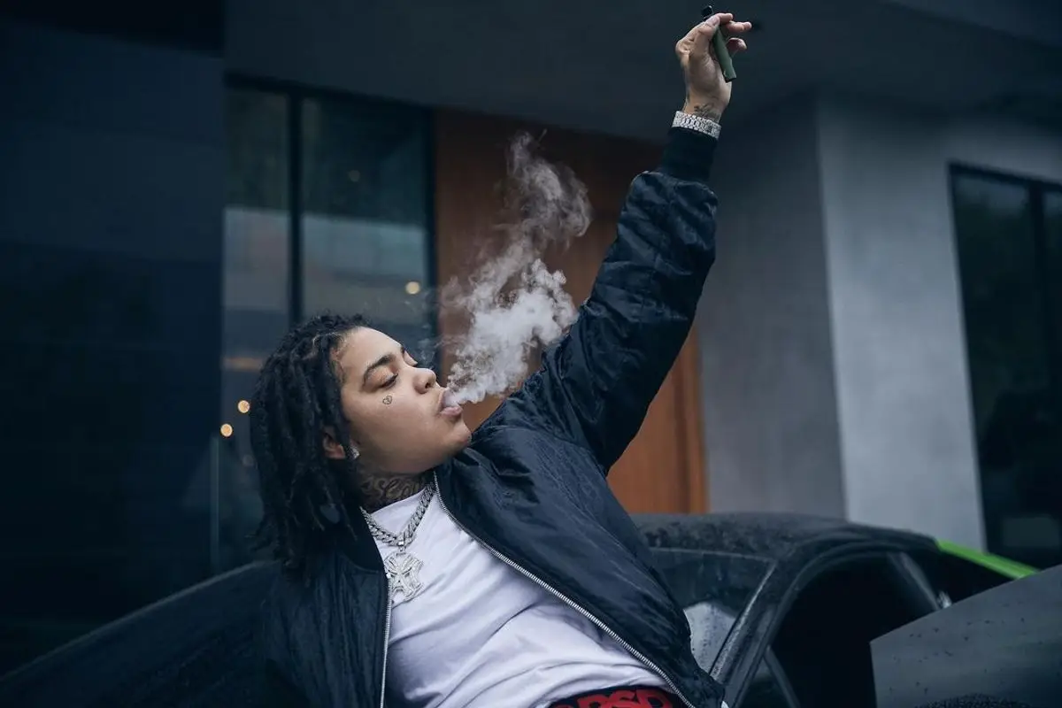 Young M.A outfit in Dior, Amiri, and PSD, 2021