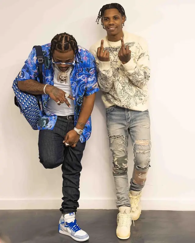 Rowdy Rebel outfit in Dior, Nike, and Cartier, 2021
