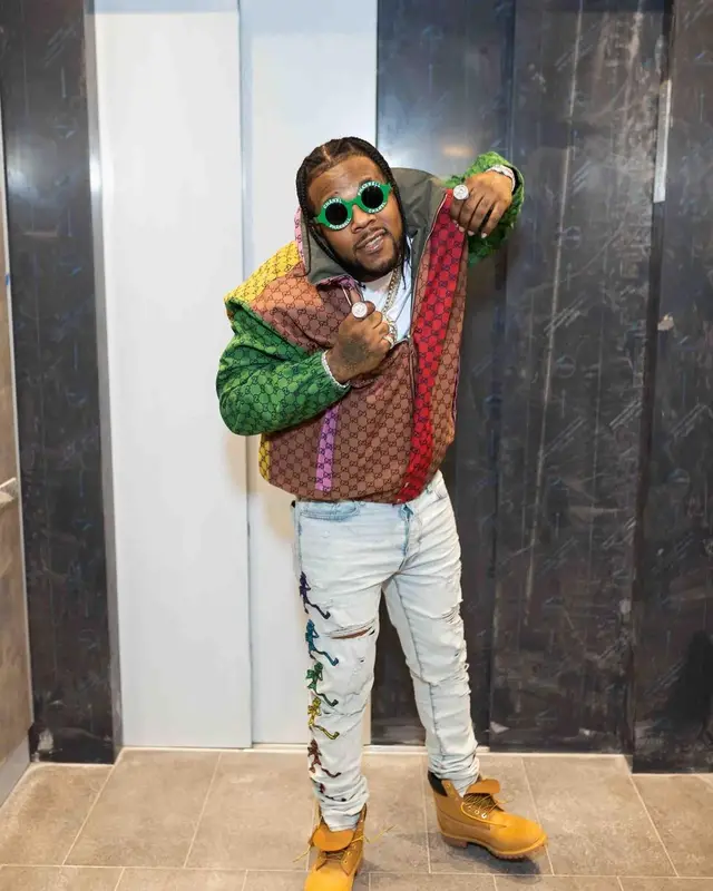 Rowdy Rebel outfit in Gucci, Chanel, and Pharrell Williams Merch, 2021