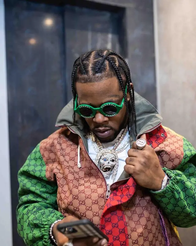 Rowdy Rebel outfit in Gucci, Chanel, and Pharrell Williams Merch, 2021