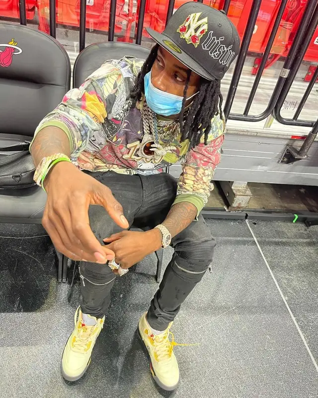 Polo G outfit in Supreme, Amiri, and Jordan, 2021