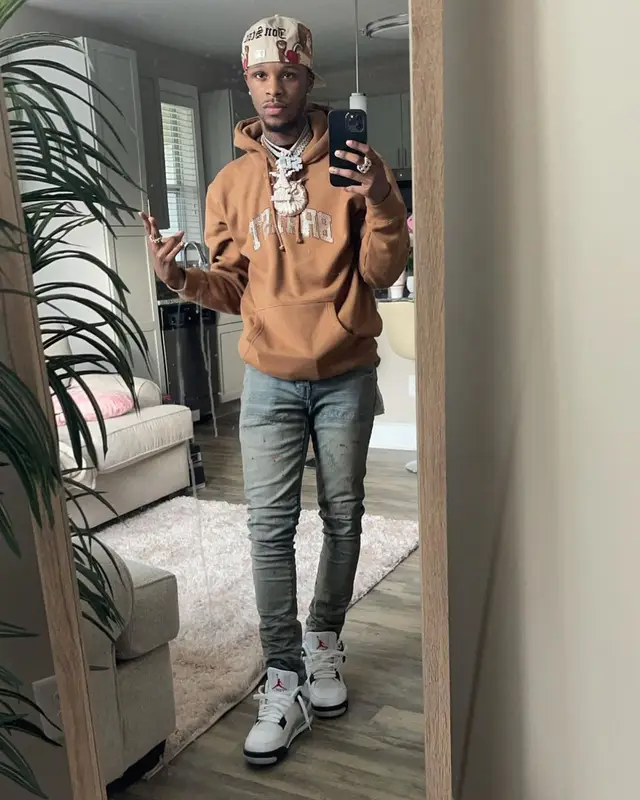 Toosii outfit in Purple Brand, Jordan, and Jon Stan, 2021