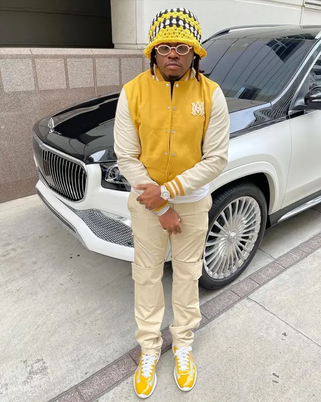 Gunna outfit in Givenchy, Cartier, and Amiri, 2021