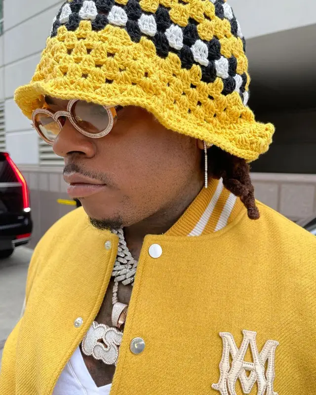 Gunna outfit in Givenchy, Cartier, and Amiri, 2021