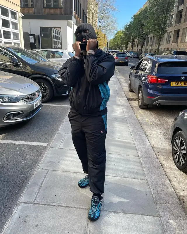 Headie One outfit in Nike and Skepta Merch, 2021