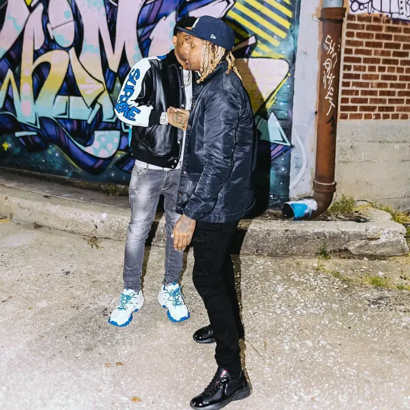 Lil Durk outfit in 1017 Alyx 9SM, Amiri, and New Era, 2021